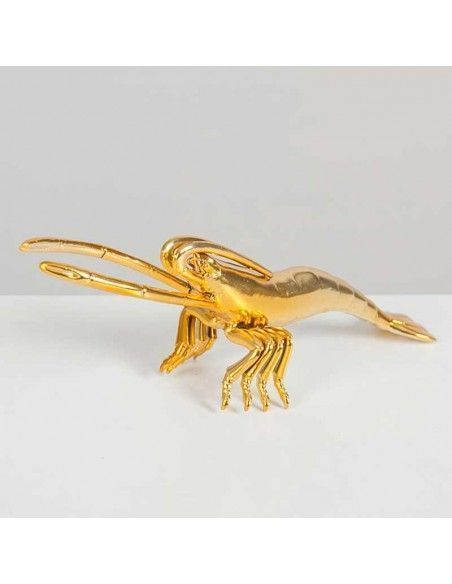 FIGURA GAMBA DORADA