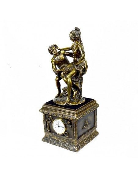 RELOJ DE SOBREMESA CON FIGURA ORO VIEJO