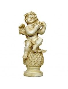 FIGURA DE ANGEL CON HOJA Y FRUTA