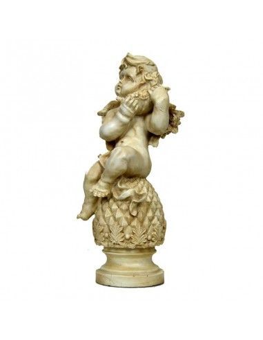 FIGURA DE ANGEL CON HOJA Y FRUTA