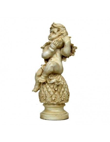 FIGURA DE ANGEL CON HOJA Y FRUTA